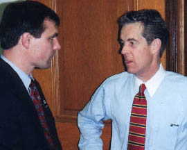 State Senator John Andrews chats with Representative Shawn Mitchell while on break from budget talks.