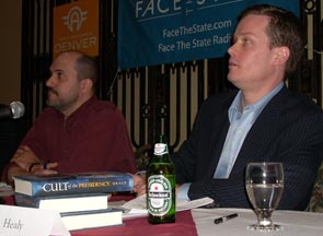 Jon Caldara and Gene Healy seated.