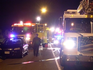 Emergency vehicles at the site of the train derailment.