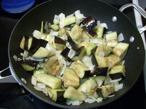 A dish with eggplant and onion.