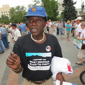 Felix Diawuoh wears a shirt from the Rocky Mountain Black Tea Party.