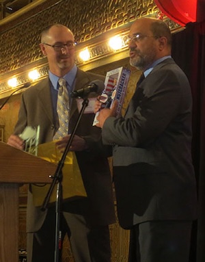 Ari Armstrong and Jon Caldara on stage.