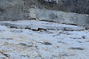 Support walls and the water retention wall at Dinosaur Ridge are failing.