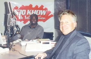 Reggie Rivers in the radio studio with Bill Masters.